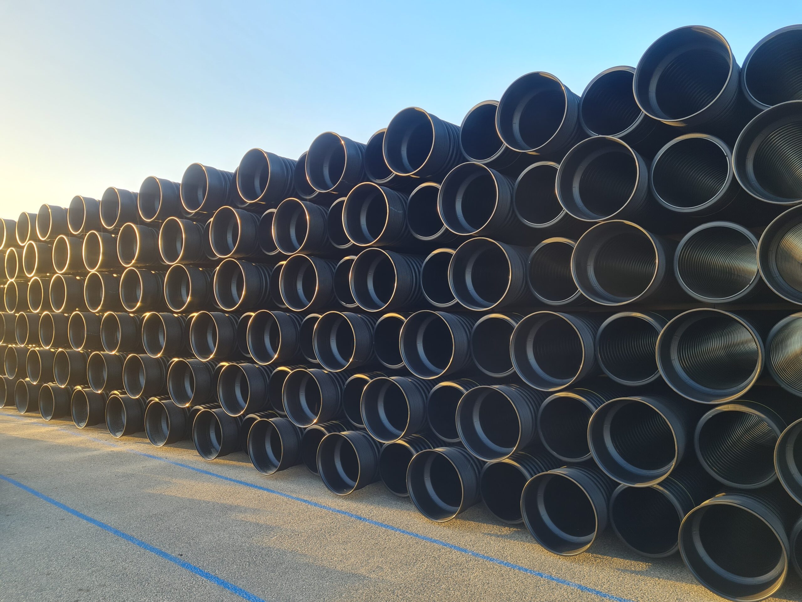 Corrugated rHDPE pipe yard bulk stack
